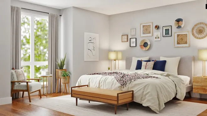 Design reference: bedroom with a low platform bed, a gallery wall of framed art, table lamps
